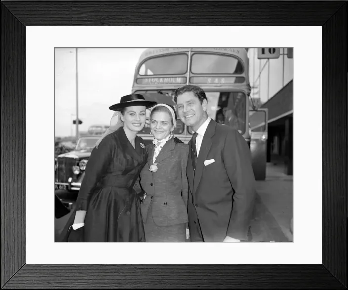 Framed Print : Actress Anita Ekberg left seen here with her husband Anthony Steel greeting her sister