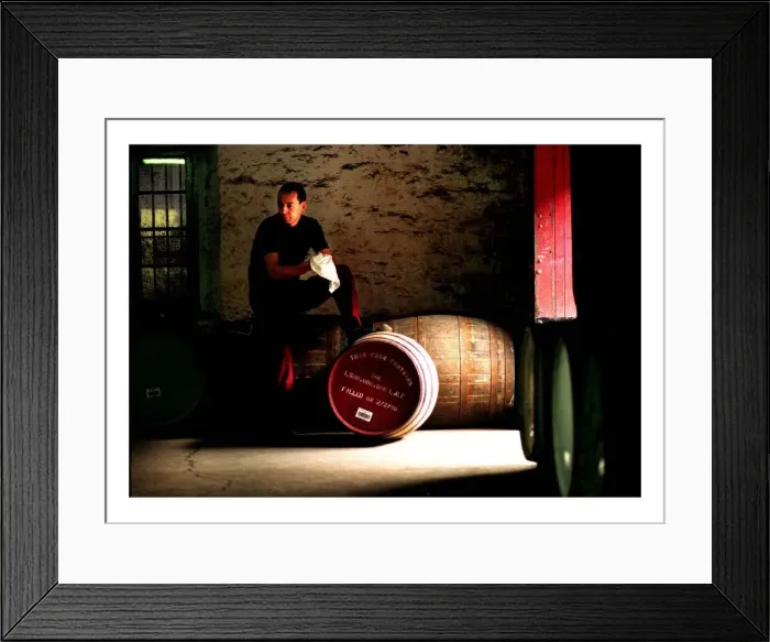 Framed Print : Kenny Matthews with a special whisky cask, produced by North British Distillery in Framed Print : Kenny Matthews with a special whisky cask, produced by North British Distillery in
