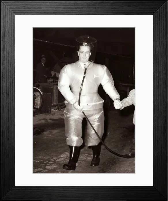 Framed Print : A man wearing an air filled Atom Suit to be used at Britain Framed Print : A man wearing an air filled Atom Suit to be used at Britain