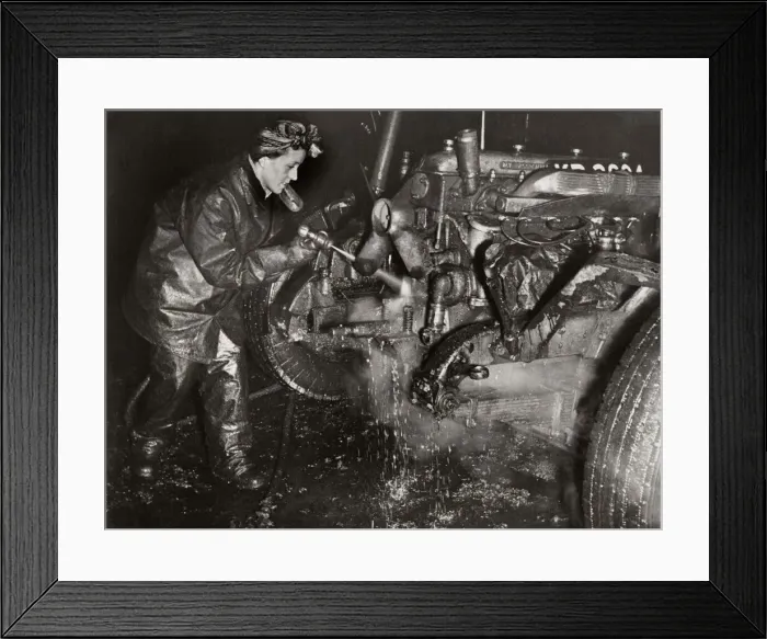 Framed Print : World War Two. Mrs M Bryan dressed in protective clothing cleaning dirt Framed Print : World War Two. Mrs M Bryan dressed in protective clothing cleaning dirt
