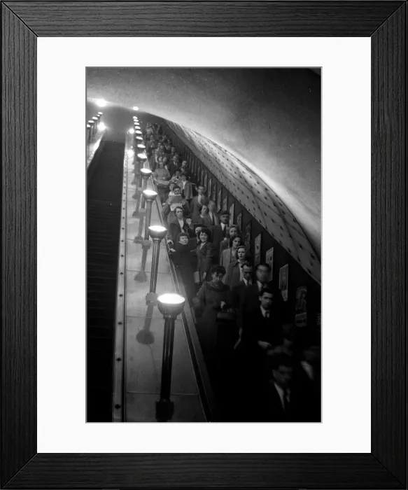 Framed Print : Commuters seen here taking the escalator down to the Central Line during the rush hour Framed Print : Commuters seen here taking the escalator down to the Central Line during the rush hour