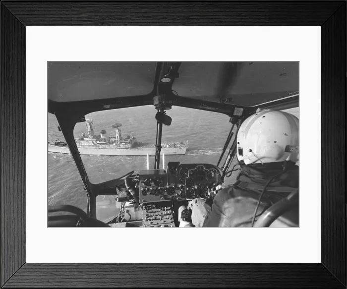 Framed Print : The helicopter heads towards the landing platform on the stern of HMS Aurora during a Framed Print : The helicopter heads towards the landing platform on the stern of HMS Aurora during a