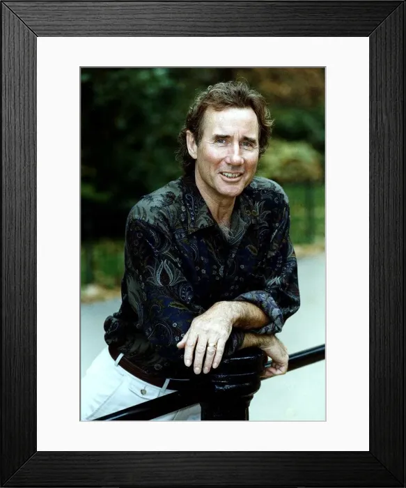 Framed Print : Jim Dale British Comedy Actor wearing patterned shirt leaning on metal railing