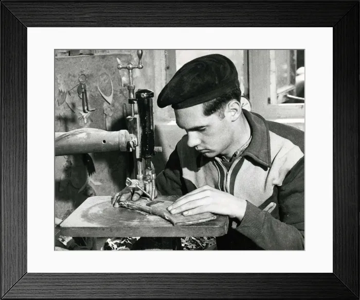 Framed Print : A worker concentarting at his table at a Horn making factory April 1953 Framed Print : A worker concentarting at his table at a Horn making factory April 1953