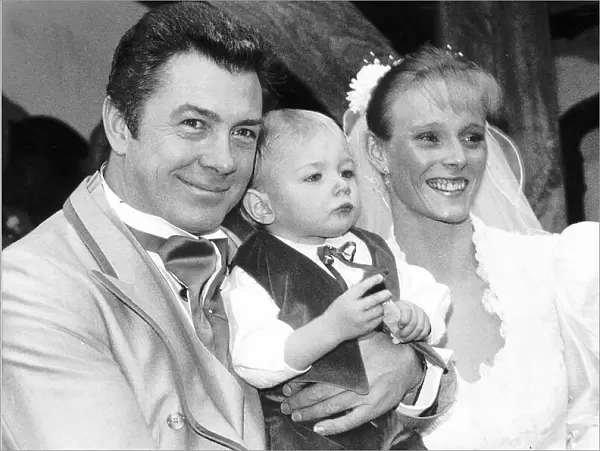 Lewis Collins Actor with wife Michelle Larrett and their 19-month old son Oliver at their