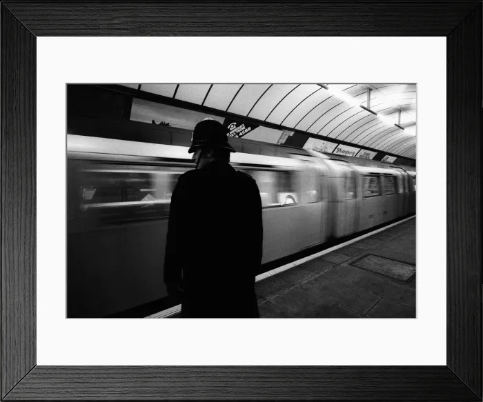 Framed Print : Following a series of terrorist attacks across the capital a policeman seen here Framed Print : Following a series of terrorist attacks across the capital a policeman seen here