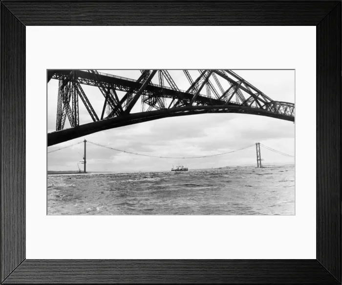 Framed Print : Forth Railway Bridge June 1962 Framed by the Forth Bridge is the ferry that carries