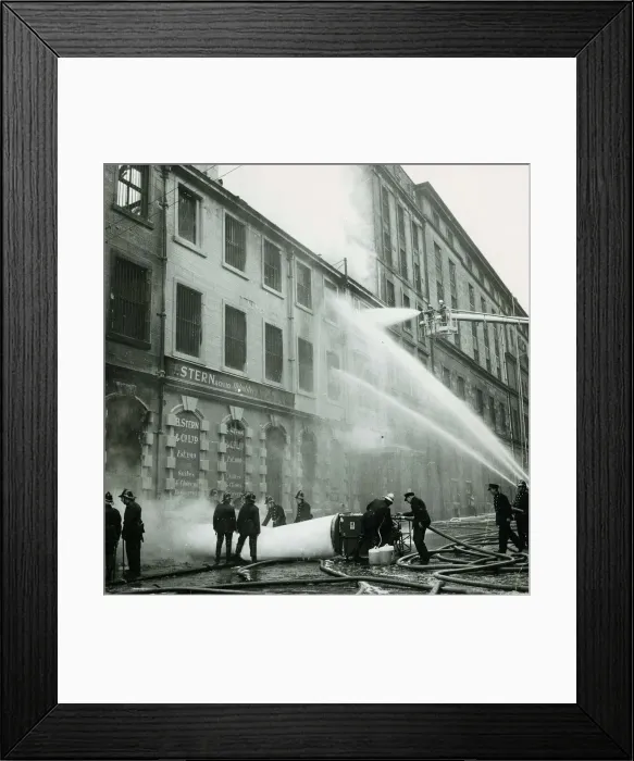 Framed Print : Firemen hosing down a building after a warehouse fire on James Watt Street in Glasgow Framed Print : Firemen hosing down a building after a warehouse fire on James Watt Street in Glasgow