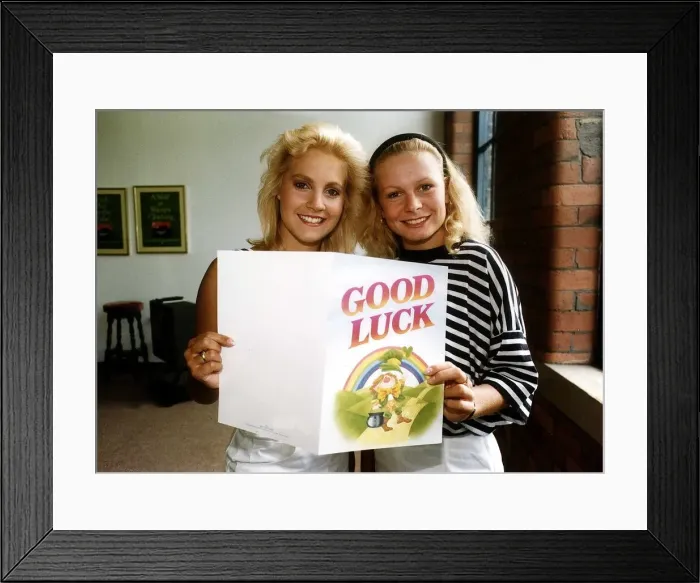 Framed Print : Glenda McKay with Actress Mellnida Burrows holding up good luck card Framed Print : Glenda McKay with Actress Mellnida Burrows holding up good luck card