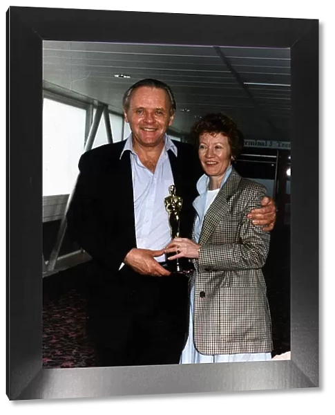 Anthony Hopkins Actor Arrives back at Heathrow with the oscar he won for the silence of