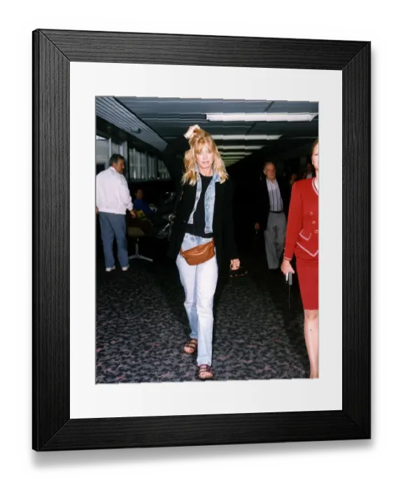 Framed Print : Goldie Hawn Actress walking through an Airport