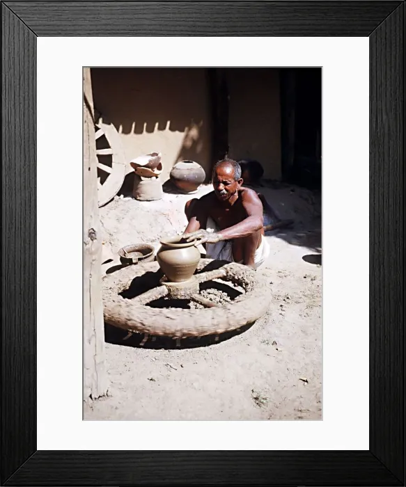 Framed Print : Muria tribal (Gonds) forming clay pot at Narainpur Bastar District MP India Framed Print : Muria tribal (Gonds) forming clay pot at Narainpur Bastar District MP India