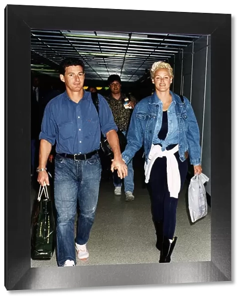 Brigitte Nielsen actress with her boyfriend arrive at Heathrow Airport