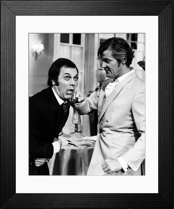 Framed Print : Tony Curtis and Roger Moore ham it up on the set of the Television series THE PERSUADERS Framed Print : Tony Curtis and Roger Moore ham it up on the set of the Television series THE PERSUADERS