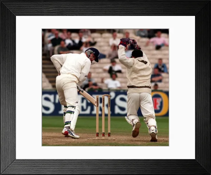 Framed Print : Dominic Cork is bowled out at Old Trafford July 1998 During the third test against Framed Print : Dominic Cork is bowled out at Old Trafford July 1998 During the third test against