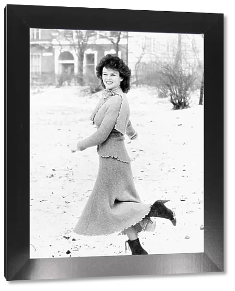 Garielle Drake actress standing in snow covered park January 1985