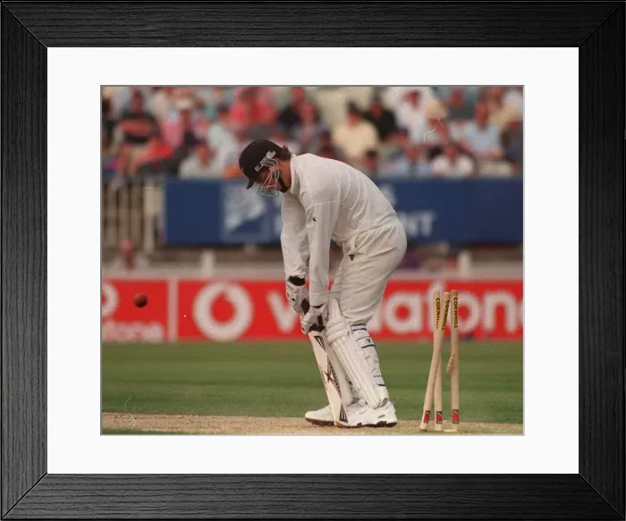 Framed Print : Daniel Vettori Cricket Player Of New Zealand July 1999 Is Bowled Out By Andy