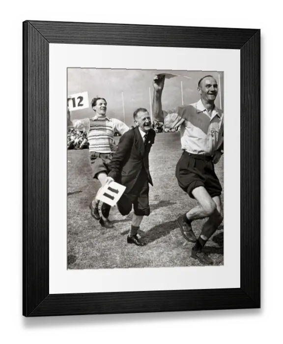 Framed Print : Life in The Mirror feature action during the knobbly knees contest at a British holiday Framed Print : Life in The Mirror feature action during the knobbly knees contest at a British holiday