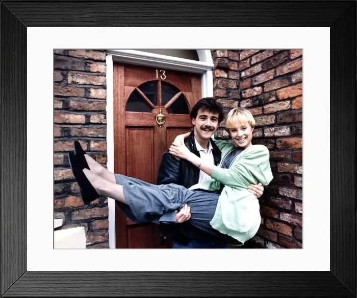 Framed Print : Michael Levell with Sally Whittacker outside their street home February 1988 Framed Print : Michael Levell with Sally Whittacker outside their street home February 1988