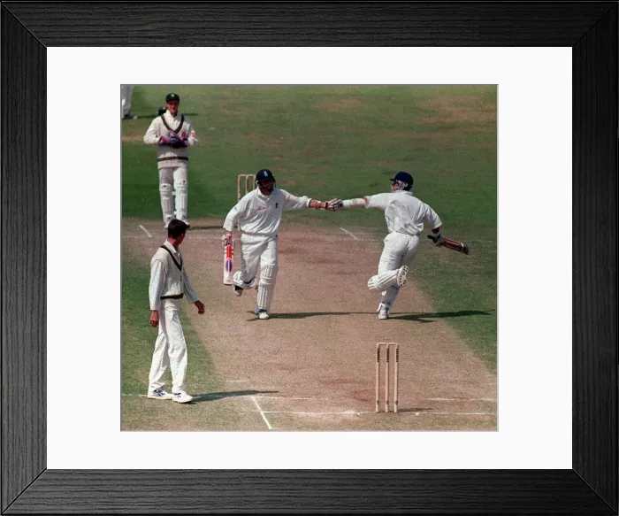 Framed Print : Alec Stewart and Mike Atherton Cricket players July 1998 touch hands during