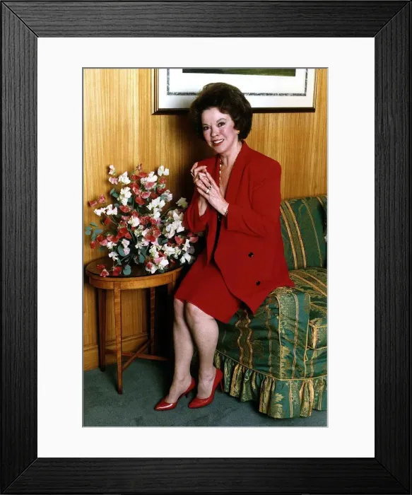 Framed Print : Shirley Temple pictured in her hotel room before flying back to the States Framed Print : Shirley Temple pictured in her hotel room before flying back to the States