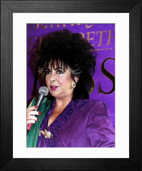Framed Print : Elizabeth Taylor Actress at a Business conference on perfume October 1989