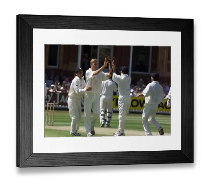Framed Print : Alan Mullally celebrates with Mark Ramprakesh July 1999 (left Framed Print : Alan Mullally celebrates with Mark Ramprakesh July 1999 (left