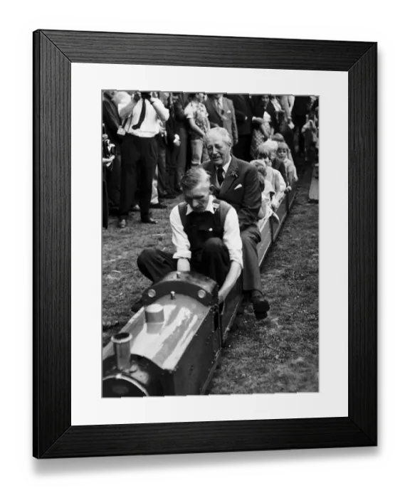 Framed Print : Harold MacMillan Tory Prime Minister enjoys a ride on the minature railway during his