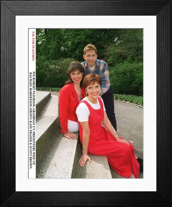 Framed Print : Rachael Robertson TV Presenter with Kate Fraser and Scott Brown sitting on concrete steps