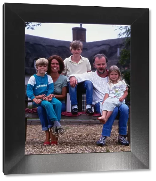 John Peel DJ Disc Jockey July 1987 with three of his children and his wife