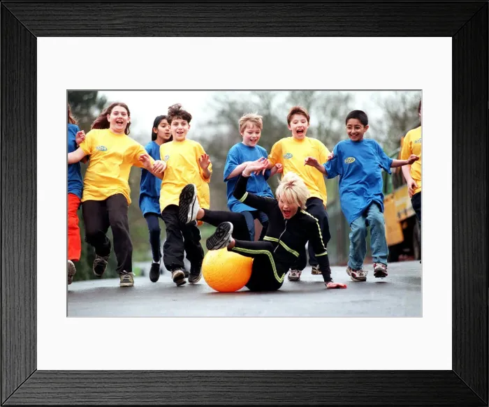 Framed Print : Sally Gray TV Presenter of the new 50 / 50 childrens show on a space hopper - March 1998 Framed Print : Sally Gray TV Presenter of the new 50 / 50 childrens show on a space hopper - March 1998