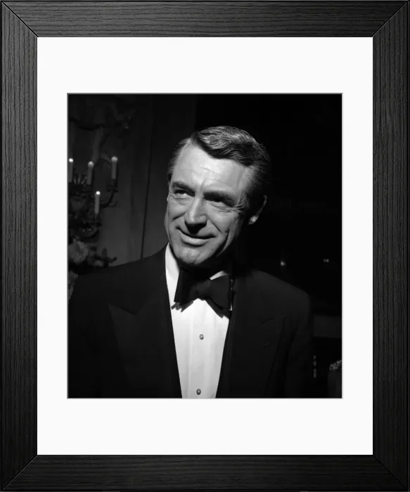 Framed Print : Cary Grant between takes filming Indiscreet at the Royal Opera House, December 1957