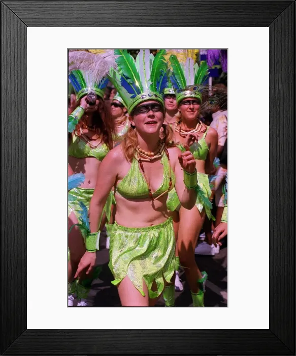 Framed Print : Dancers in the streets of Notting Hill for the carnival August 1999
