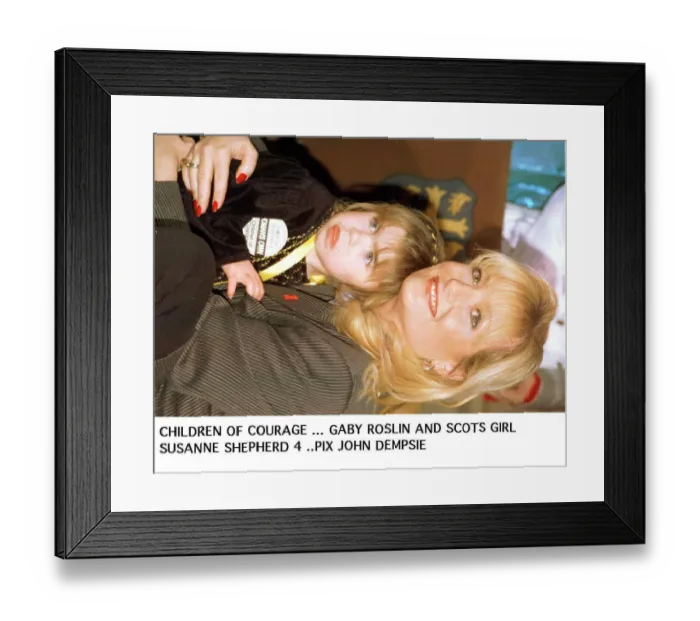 Framed Print : Gaby Roslin cuddles Suzanne Shephard - one of 1995 Children of courage the Ayrshire girl Framed Print : Gaby Roslin cuddles Suzanne Shephard - one of 1995 Children of courage the Ayrshire girl