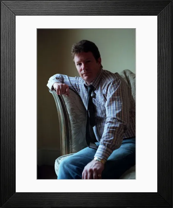 Framed Print : Jim Davidson Comedian / TV Presenter October 1998 Sitting on sofa at home Framed Print : Jim Davidson Comedian / TV Presenter October 1998 Sitting on sofa at home