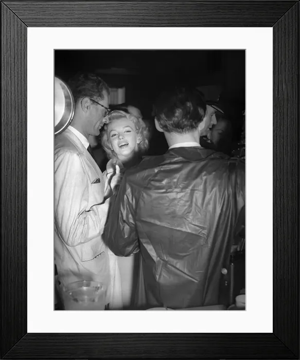 Framed Print : Marilyn Monroe with husband Arthur Miller at London airport, July 1956