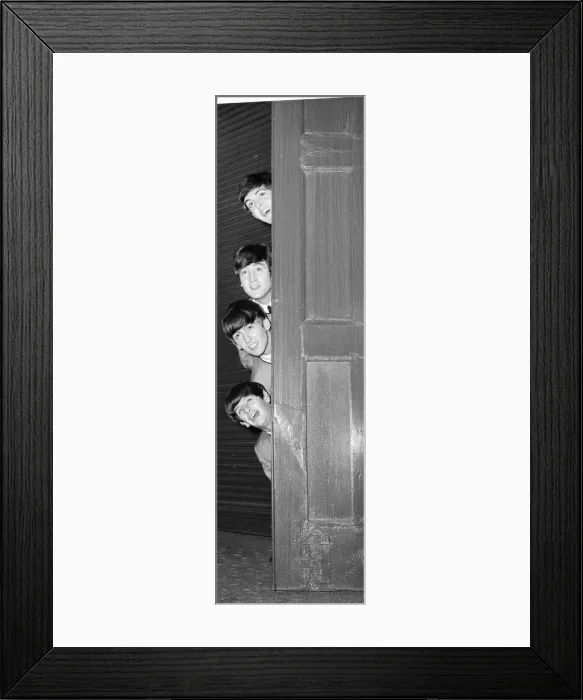 Framed Print : The Beatles peering out from behind a door. before the groups appearence at Sunday Night Framed Print : The Beatles peering out from behind a door. before the groups appearence at Sunday Night