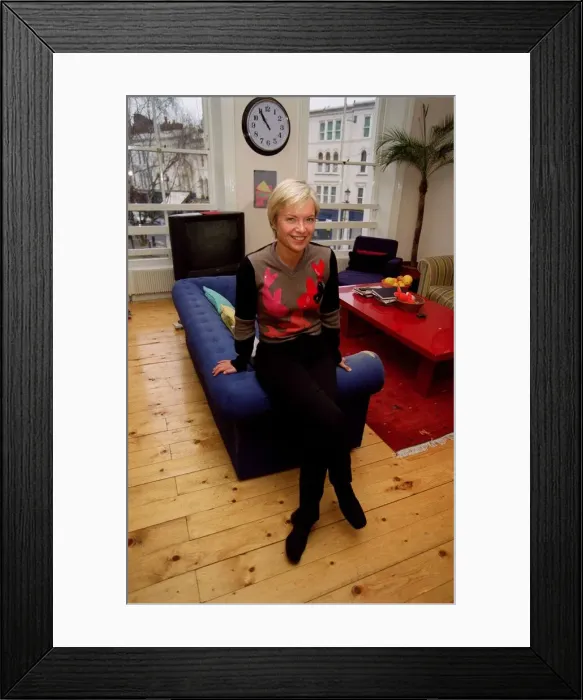 Framed Print : Mareilla Forstrup TV Presenter Sitting on sofa at home December 1998 Framed Print : Mareilla Forstrup TV Presenter Sitting on sofa at home December 1998