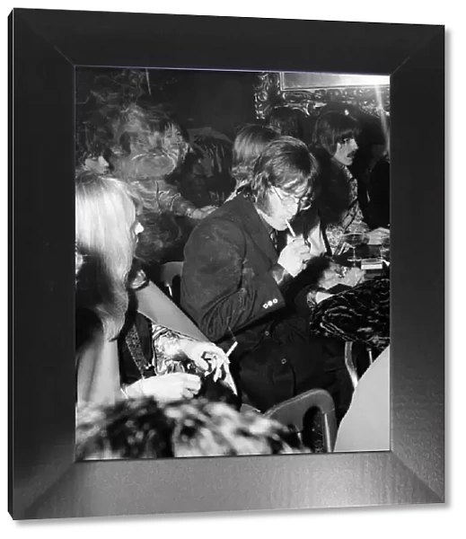 John Lennon attends Quorum fashion show at Revolution club with George Harrison to see