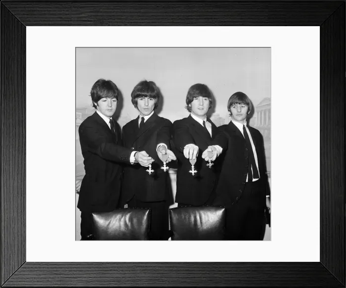 Framed Print : The Beatles pose with their MBEs at a press conference held at the Saville Theatre Framed Print : The Beatles pose with their MBEs at a press conference held at the Saville Theatre