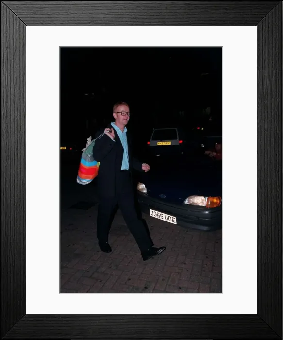 Framed Print : Chris Evans Radio / TV Presenter June 1998 On a night out holding bag Framed Print : Chris Evans Radio / TV Presenter June 1998 On a night out holding bag