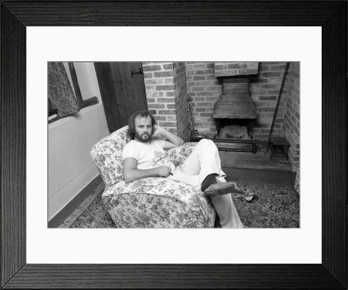 Framed Print : DJ John Peel at home sitting in lounge 1975 John Peel BBC Radio 1