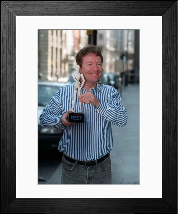 Framed Print : Jim Davidson Comedian / TV Presenter October 1997 Holding the new Generation Game show Framed Print : Jim Davidson Comedian / TV Presenter October 1997 Holding the new Generation Game show