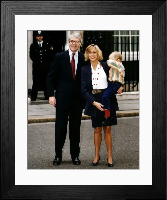 Framed Print : John Major is pictured outside No. 10 Downing Street this morning with three year old Framed Print : John Major is pictured outside No. 10 Downing Street this morning with three year old