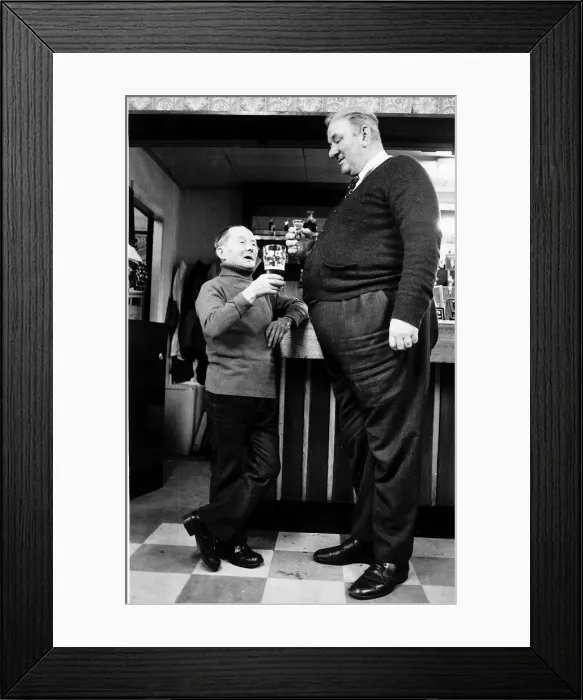 Framed Print : Joe Herdman 4ft ex miner with his drinking partner Roy Williams who tips the scales at 25 Framed Print : Joe Herdman 4ft ex miner with his drinking partner Roy Williams who tips the scales at 25