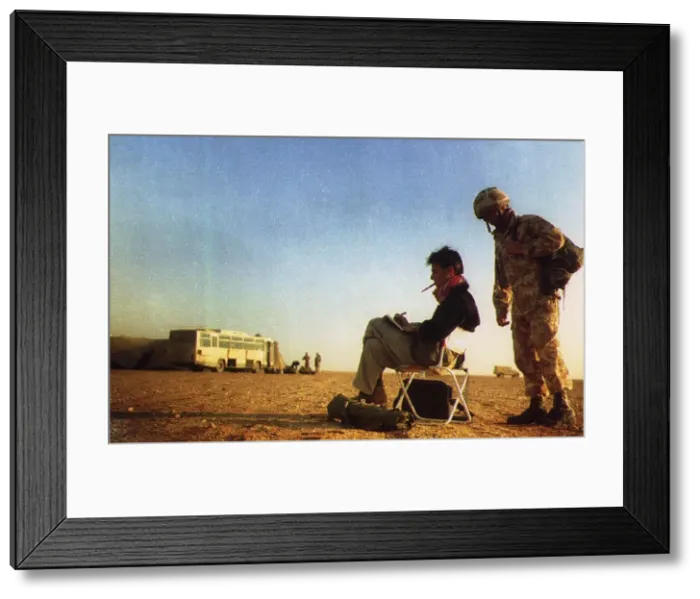 Framed Print : John Kean Official British war artist sketching in the desert on the Saudi border Framed Print : John Kean Official British war artist sketching in the desert on the Saudi border