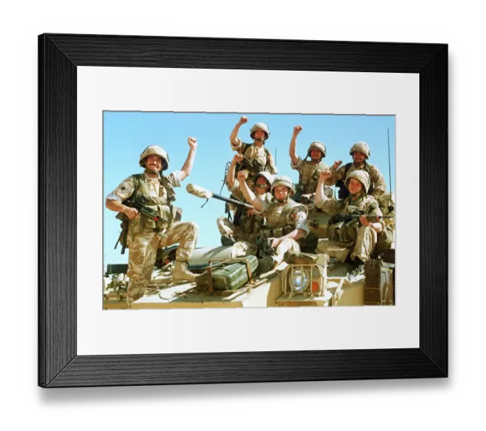 Framed Print : British infantrymen celebrate on a Warrior Armoured Personnel Carrier during the Gulf