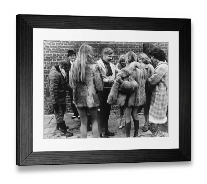Framed Print : Comedian Benny Hill with girls during filming 1978