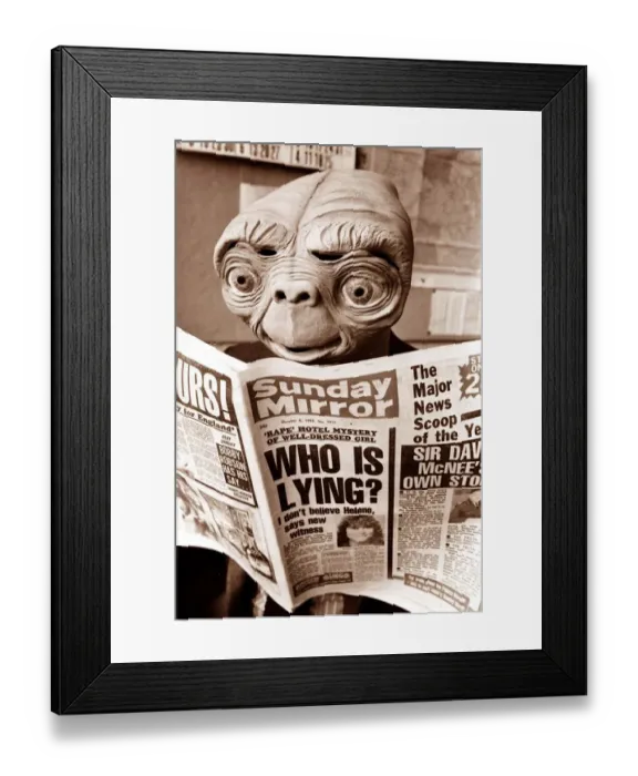 Framed Print : E. T reading Sunday Mirror Newspaper - October 1982 Extra Terrestrial Framed Print : E. T reading Sunday Mirror Newspaper - October 1982 Extra Terrestrial