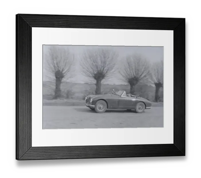 Framed Print : Ronald Helterington from Birmingham seen here with Reg Pannell in his Aston Martin D. B. 2